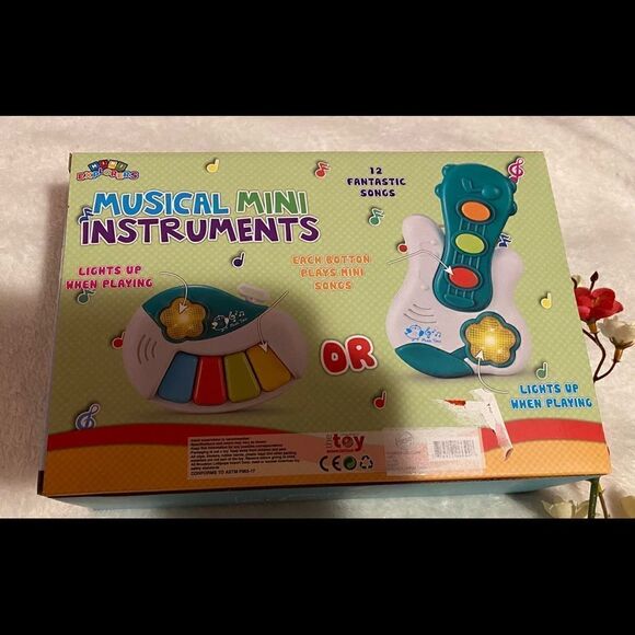 🛍Mini explorers Mini Instruments classic Guitar Plays 12 Songs 18+months - Picture 3 of 7